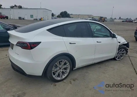 2023 Tesla Model Y from USA, damaged, VIN 7SAYGDEE0PF712629